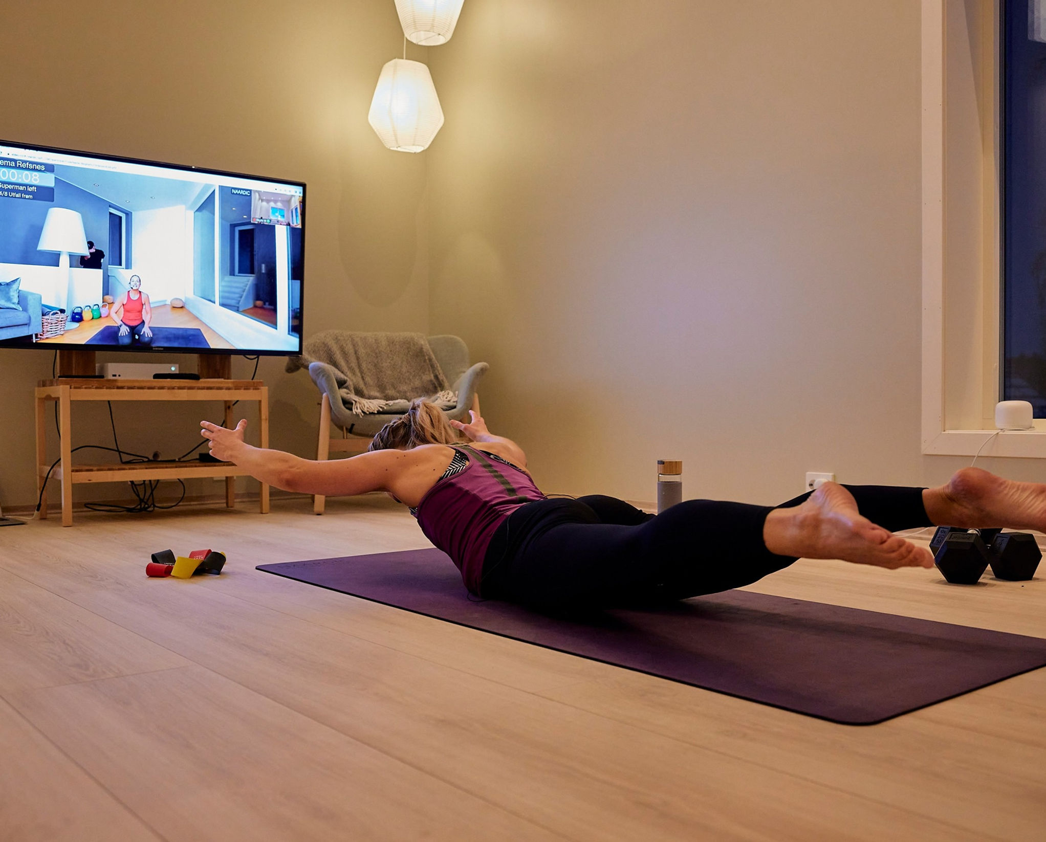 Fitness instructor using the LiveSwitch platform for remote training